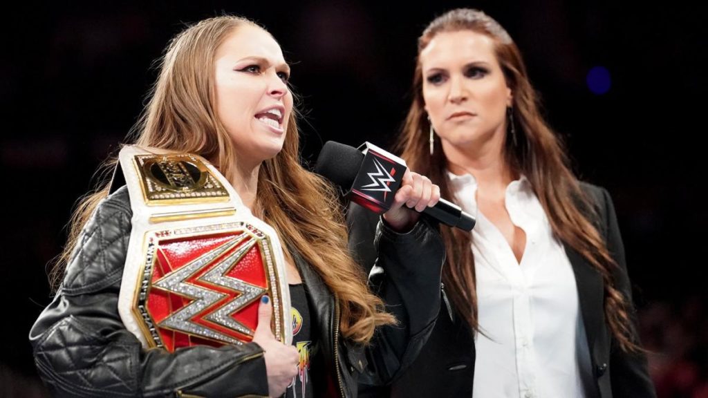 Ronda Rousey, Stephanie McMahon) (source: WWE)