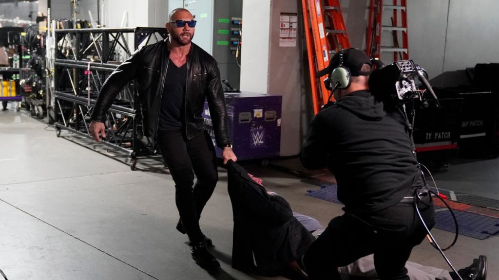 Batista,, Ric Flair (source: WWE)