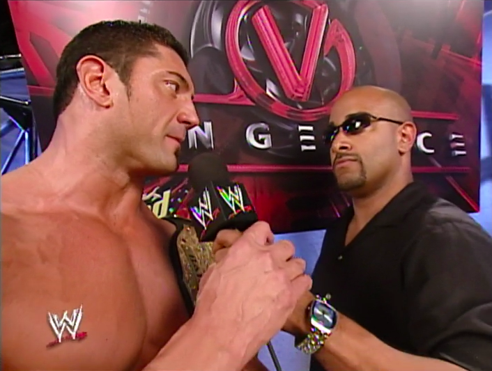 Batista, Jonathan Coachman (source: WWE)