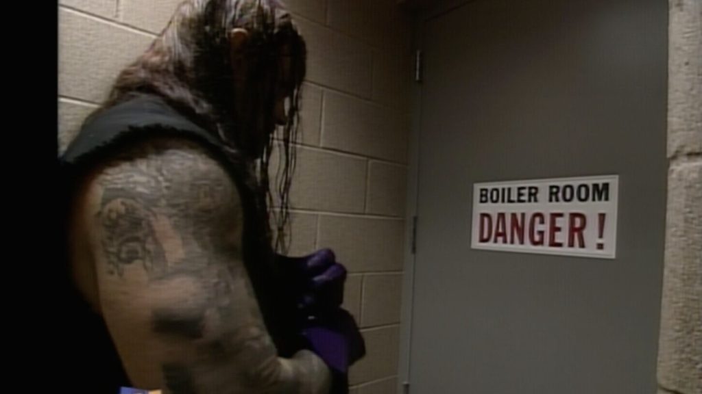 The Undertaker prepares for his Boiler Room Brawl with Mankind. (source: WWE)